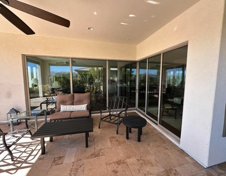 Sliding glass patio doors cleaned on a covered patio