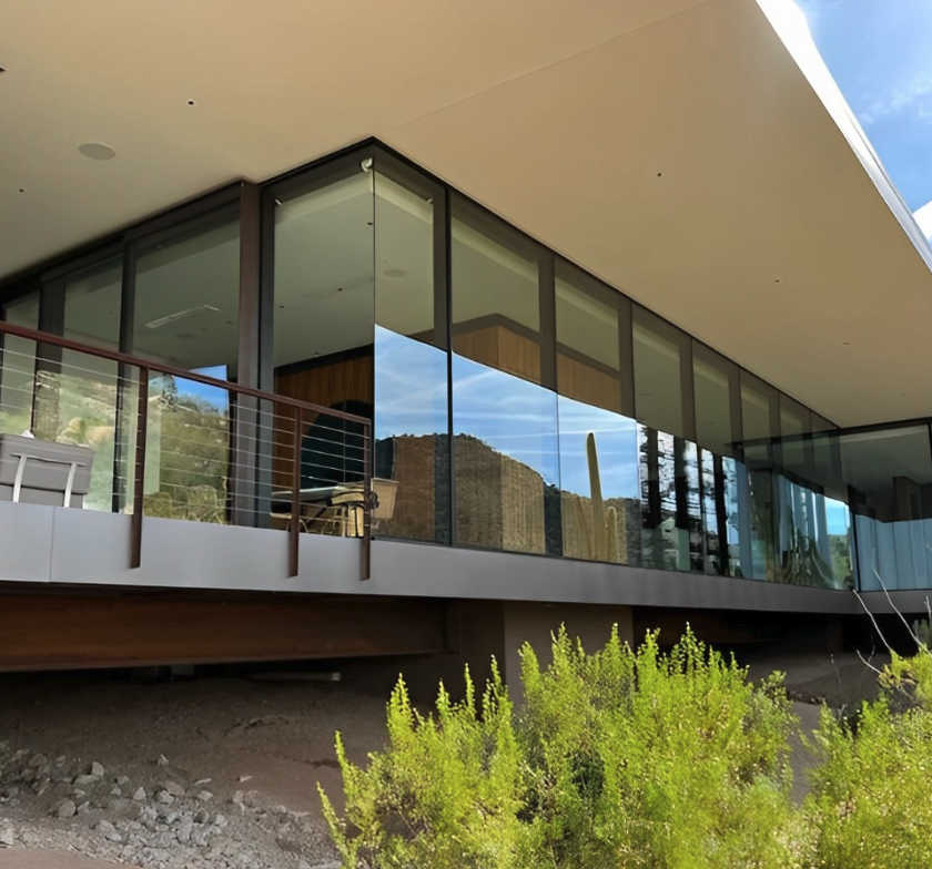 Glass balcony railing cleaned on a Manhattan Beach home
